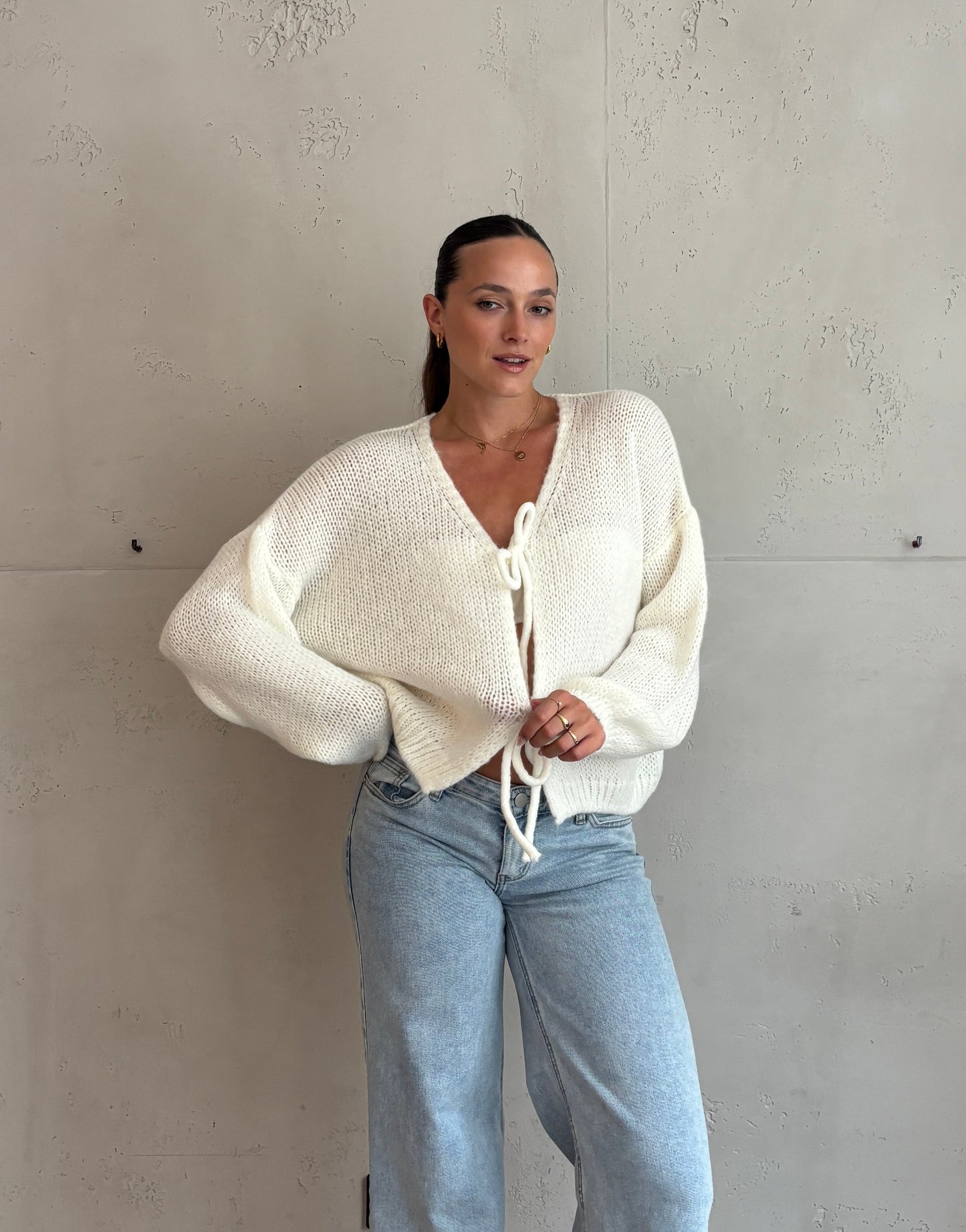 Weicher Schleifen-Pullover