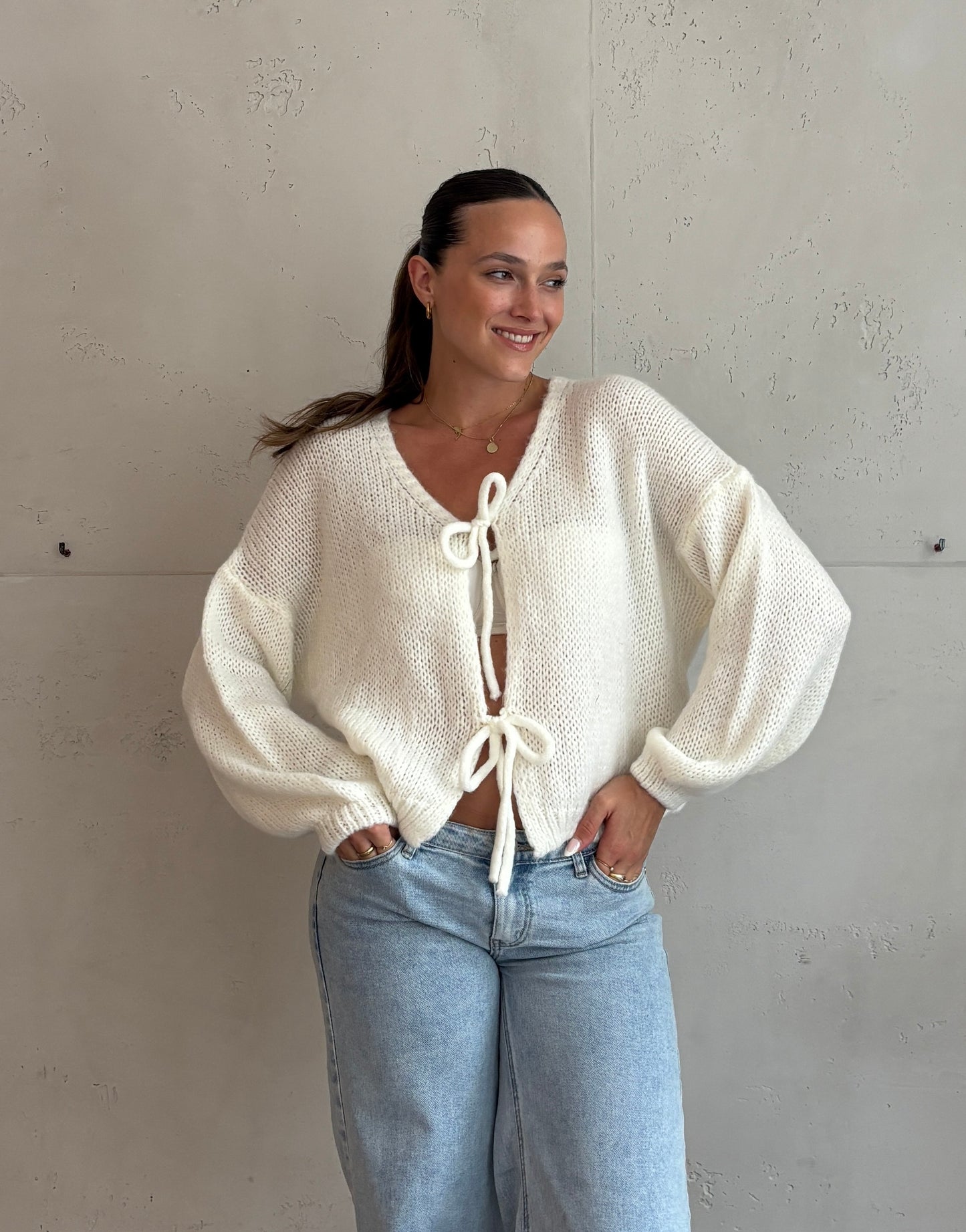 Weicher Schleifen-Pullover
