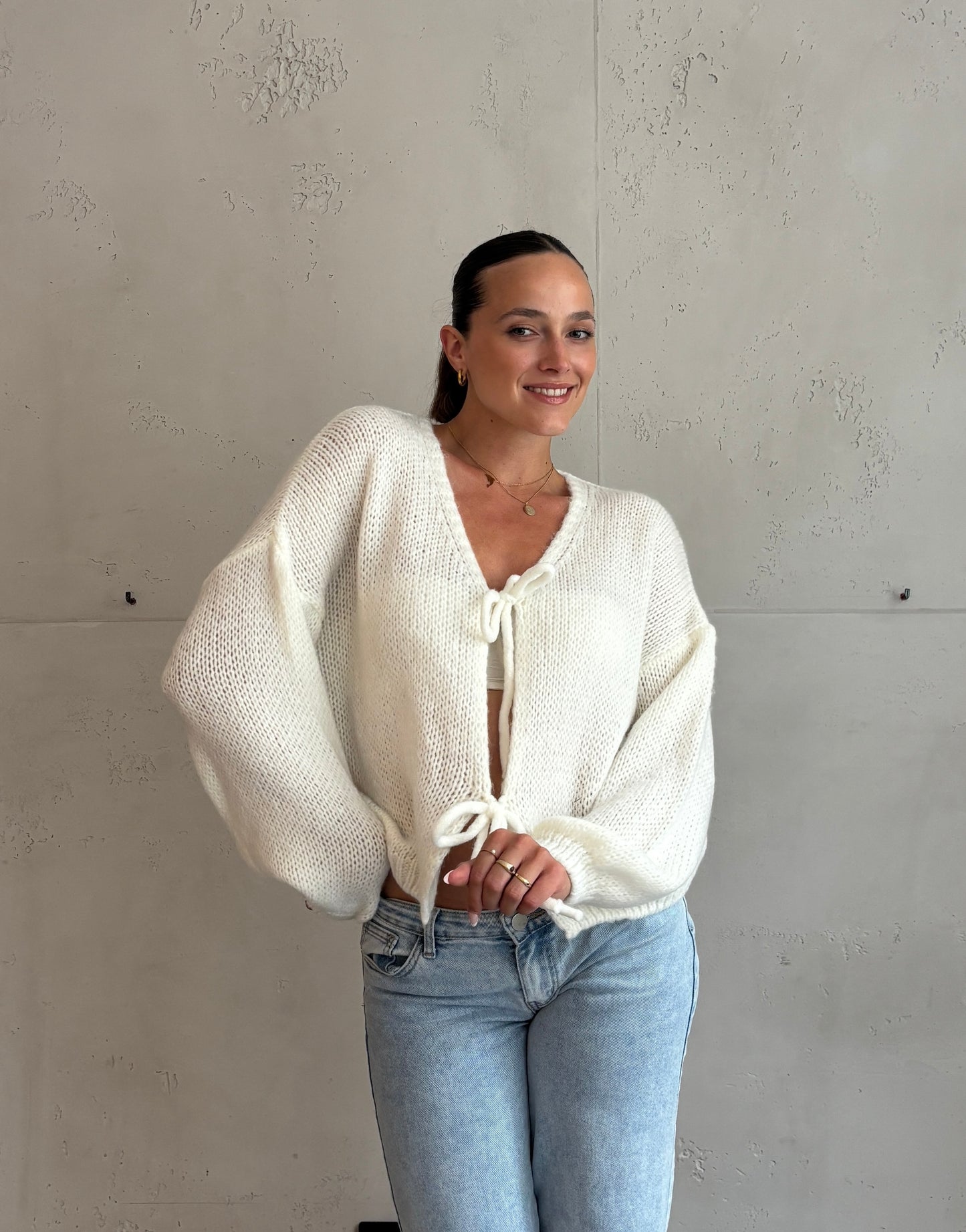 Weicher Schleifen-Pullover