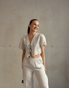Bluse mit Lochdesign und Schleifen - Switch - Fashion